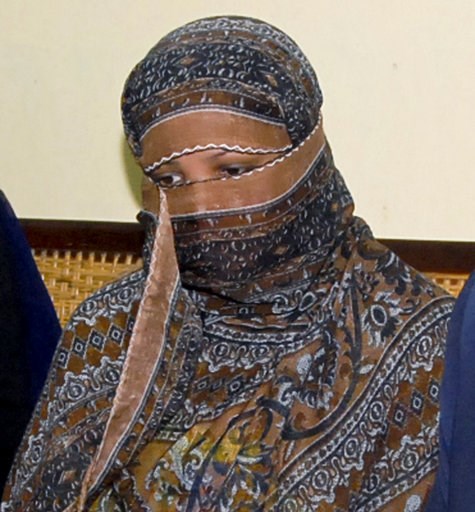 (AP Photo, File). FILE - In this Nov. 20, 2010, file photo, Aasia Bibi, a Pakistani Christian woman, listens to officials at a prison in Sheikhupura near Lahore, Pakistan. Bibi after eight years on death row for blasphemy has been freed from jail and w... (AP Photo, File). FILE - In this Nov. 20, 2010, file photo, Aasia Bibi, a Pakistani Christian woman, listens to officials at a prison in Sheikhupura near Lahore, Pakistan. Bibi after eight years on death row for blasphemy has been freed from jail and w...