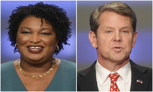 (AP Photos/John Amis, File). This combination of May 20, 2018, photos shows Georgia gubernatorial candidates Stacey Abrams, left, and Brian Kemp in Atlanta. Democrats and Republicans nationwide will have to wait a bit longer to see if Georgia elects t... (AP Photos/John Amis, File). This combination of May 20, 2018, photos shows Georgia gubernatorial candidates Stacey Abrams, left, and Brian Kemp in Atlanta. Democrats and Republicans nationwide will have to wait a bit longer to see if Georgia elects t...