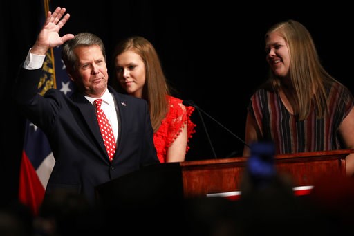 (Joshua L. Jones/Athens Banner-Herald via AP). Georgia Republican gubernatorial candidate Brian Kemp acknowledges supporters early Wednesday, Nov. 7, 2018, after a long election night in Athens, Ga. (Joshua L. Jones/Athens Banner-Herald via AP). Georgia Republican gubernatorial candidate Brian Kemp acknowledges supporters early Wednesday, Nov. 7, 2018, after a long election night in Athens, Ga.
