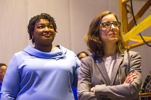 (Alyssa Pointer/Atlanta Journal-Constitution via AP). Georgia gubernatorial candidate Stacey Abrams, left, stands with her campaign manager, Lauren Groh-Wargo, before speaking to her supporters during an election night watch party at the Hyatt Regency ... (Alyssa Pointer/Atlanta Journal-Constitution via AP). Georgia gubernatorial candidate Stacey Abrams, left, stands with her campaign manager, Lauren Groh-Wargo, before speaking to her supporters during an election night watch party at the Hyatt Regency ...