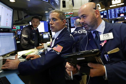 (AP Photo/Richard Drew, File). FILE- In this Oct. 26, 2016, file photo specialist Anthony Rinaldi, left, works with trader Fred DeMarco on the floor of the New York Stock Exchange. The U.S. stock market opens at 9:30 a.m. EDT on Thursday, Nov. 8. (AP Photo/Richard Drew, File). FILE- In this Oct. 26, 2016, file photo specialist Anthony Rinaldi, left, works with trader Fred DeMarco on the floor of the New York Stock Exchange. The U.S. stock market opens at 9:30 a.m. EDT on Thursday, Nov. 8.
