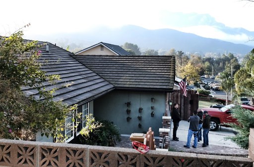 (AP Photo/Richard Vogel). Ventura County Sheriff's deputies stand outside the house of shooting suspect David Ian Long in Newbury Park, Calif., on Thursday, Nov. 8, 2018. Authorities said the former Marine opened fire at a country music bar in Southern... (AP Photo/Richard Vogel). Ventura County Sheriff's deputies stand outside the house of shooting suspect David Ian Long in Newbury Park, Calif., on Thursday, Nov. 8, 2018. Authorities said the former Marine opened fire at a country music bar in Southern...