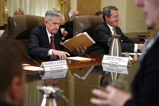 (AP Photo/Jacquelyn Martin, File). FILE- In this Oct. 31, 2018, file photo Federal Reserve Chair Jerome Powell, left, and Randal Quarles, vice chair for supervision, gather their things at the end of a Federal Reserve Board meeting at the Marriner S. E...