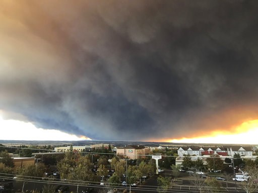 (David Little/Chico Enterprise-Record via AP). The massive plume from the Camp Fire, burning in the Feather River Canyon near Paradise, Calif., wafts over the Sacramento Valley as seen from Chico, Calif., on Thursday, Nov. 8, 2018. Authorities in North... (David Little/Chico Enterprise-Record via AP). The massive plume from the Camp Fire, burning in the Feather River Canyon near Paradise, Calif., wafts over the Sacramento Valley as seen from Chico, Calif., on Thursday, Nov. 8, 2018. Authorities in North...