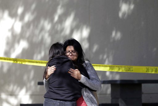 (AP Photo/Marcio Jose Sanchez). Mourners embrace outside of the Thousand Oaks Teen Center on Thursday, Nov. 8, 2018, where relatives and friends gathered in the aftermath of the Wednesday night mass shooting, in Thousand Oaks, Calif. Multiple people we... (AP Photo/Marcio Jose Sanchez). Mourners embrace outside of the Thousand Oaks Teen Center on Thursday, Nov. 8, 2018, where relatives and friends gathered in the aftermath of the Wednesday night mass shooting, in Thousand Oaks, Calif. Multiple people we...