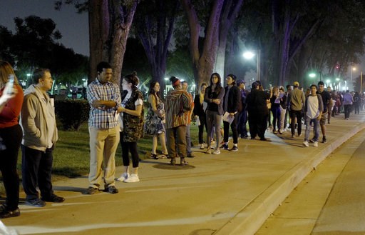 (Keith Birmingham/The Orange County Register via AP). A long line of people wait in the dark on Tuesday to vote at the Los Angeles County Registrar Recorders office in Norwalk, Calif., on Tuesday, Nov. 6, 2018. (Keith Birmingham/The Orange County Register via AP). A long line of people wait in the dark on Tuesday to vote at the Los Angeles County Registrar Recorders office in Norwalk, Calif., on Tuesday, Nov. 6, 2018.
