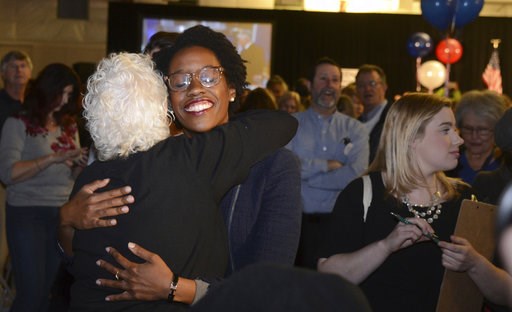 (Rick West/Daily Herald via AP). FILE - In this Nov. 6, 2018 file photo, Illinois candidate for the 14th congressional district Lauren Underwood visits with others at her election night party in St. Charles, Ill. on Tuesday, Nov. 6, 2018. Illinois Demo... (Rick West/Daily Herald via AP). FILE - In this Nov. 6, 2018 file photo, Illinois candidate for the 14th congressional district Lauren Underwood visits with others at her election night party in St. Charles, Ill. on Tuesday, Nov. 6, 2018. Illinois Demo...