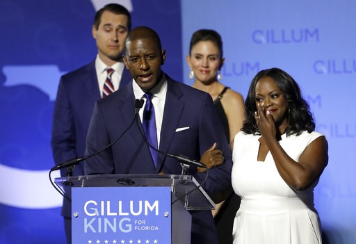 (AP Photo/Chris O'Meara). Florida Democratic gubernatorial candidate Andrew Gillum gives his concession speech as he is joined on stage by his wife R. Jai Gillum, right, and running mate Chris King and his wife Kristen Tuesday, Nov. 6, 2018, in Tallaha... (AP Photo/Chris O'Meara). Florida Democratic gubernatorial candidate Andrew Gillum gives his concession speech as he is joined on stage by his wife R. Jai Gillum, right, and running mate Chris King and his wife Kristen Tuesday, Nov. 6, 2018, in Tallaha...