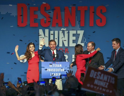 (Chris Urso/Tampa Bay Times via AP). Republican Florida Governor-elect Ron DeSantis, center, waves to the supporters with his wife, Casey, left, and Republican Lt. Governor-elect Jeanette Nunez, third right, after thanking the crowd Tuesday, Nov. 6, 20... (Chris Urso/Tampa Bay Times via AP). Republican Florida Governor-elect Ron DeSantis, center, waves to the supporters with his wife, Casey, left, and Republican Lt. Governor-elect Jeanette Nunez, third right, after thanking the crowd Tuesday, Nov. 6, 20...
