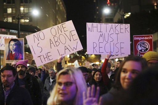 (Genna Martin/seattlepi.com via AP). Protesters march from Cal Anderson Park to the Federal Building downtown in Seattle, in support of special counsel Robert Mueller and against President Donald Trump's appointment this week of acting Attorney General... (Genna Martin/seattlepi.com via AP). Protesters march from Cal Anderson Park to the Federal Building downtown in Seattle, in support of special counsel Robert Mueller and against President Donald Trump's appointment this week of acting Attorney General...