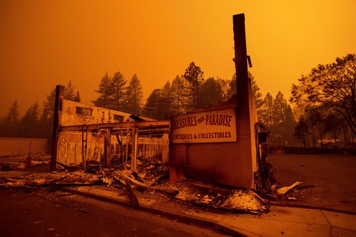 (AP Photo/Noah Berger). The walls of a scorched antique shop stand on Skyway after a wildfire burned through Paradise, Calif., on Friday, Nov. 9, 2018. (AP Photo/Noah Berger). The walls of a scorched antique shop stand on Skyway after a wildfire burned through Paradise, Calif., on Friday, Nov. 9, 2018.