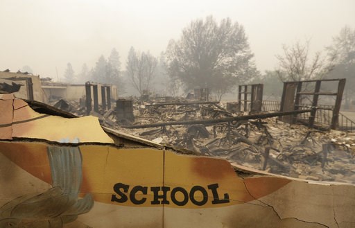 (AP Photo/Rich Pedroncelli). The burned remains of the Paradise Elementary school is seen Friday, Nov. 9, 2018, in Paradise, Calif. Blocks and blocks of homes and businesses in the Northern California town have been destroyed by a wildfire. Parts of th... (AP Photo/Rich Pedroncelli). The burned remains of the Paradise Elementary school is seen Friday, Nov. 9, 2018, in Paradise, Calif. Blocks and blocks of homes and businesses in the Northern California town have been destroyed by a wildfire. Parts of th...