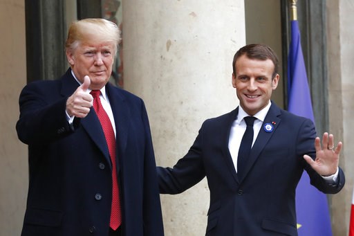 (AP Photo/Thibault Camus). French President Emmanuel Macron, right, and U.S President Donald Trump thumb up at the Elysee Palace in Paris, Saturday, Nov.10, 2018. Trump is joining other world leaders at centennial commemorations in Paris this weekend t... (AP Photo/Thibault Camus). French President Emmanuel Macron, right, and U.S President Donald Trump thumb up at the Elysee Palace in Paris, Saturday, Nov.10, 2018. Trump is joining other world leaders at centennial commemorations in Paris this weekend t...