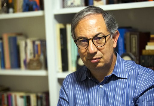 (AP Photo/ Ron Harris). In this Nov. 9, 2018 photo, Carlos del Rio, chair of the Department of Global Health at the Rollins School of Public Health at Emory University, is seen at his home in Decatur, Ga. Del Rio was initially rebuffed in his attempts ... (AP Photo/ Ron Harris). In this Nov. 9, 2018 photo, Carlos del Rio, chair of the Department of Global Health at the Rollins School of Public Health at Emory University, is seen at his home in Decatur, Ga. Del Rio was initially rebuffed in his attempts ...