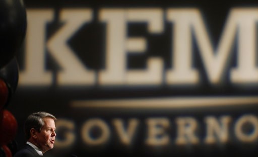 (Joshua L. Jones/Athens Banner-Herald via AP). Georgia Republican gubernatorial candidate Brian Kemp speaks with supporters after a long election night in Athens, Ga., Wednesday, Nov. 7, 2018. Georgia's hotly contested and potentially historic governor... (Joshua L. Jones/Athens Banner-Herald via AP). Georgia Republican gubernatorial candidate Brian Kemp speaks with supporters after a long election night in Athens, Ga., Wednesday, Nov. 7, 2018. Georgia's hotly contested and potentially historic governor...