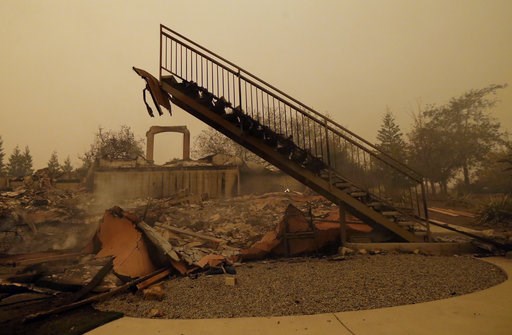 (AP Photo/Rich Pedroncelli). A staircase that once led to another level is seen among the burned remains of home Friday, Nov. 9, 2018, that was destroyed by a wildfire that swept through the area Thursday, in Paradise, Calif. (AP Photo/Rich Pedroncelli). A staircase that once led to another level is seen among the burned remains of home Friday, Nov. 9, 2018, that was destroyed by a wildfire that swept through the area Thursday, in Paradise, Calif.