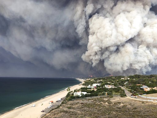 (Courtesy of Ben Watkins via AP). In this Friday, Nov. 9, 2018 photo, smoke from the wildires fills the air in Malibu, Calif. Los Angeles County fire Chief Daryl Osby said Saturday that firefighters told him they were working in the toughest, most ext... (Courtesy of Ben Watkins via AP). In this Friday, Nov. 9, 2018 photo, smoke from the wildires fills the air in Malibu, Calif. Los Angeles County fire Chief Daryl Osby said Saturday that firefighters told him they were working in the toughest, most ext...