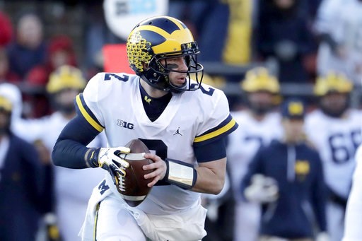 Patterson throws 3 TDs, No. 4 Michigan beats Rutgers 42-7