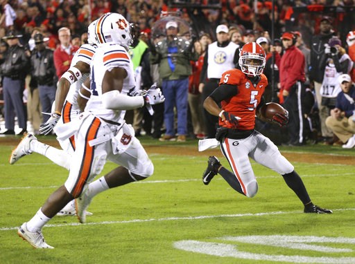 Swift runs for 186 yards, No. 5 Georgia beats Auburn 27-10
