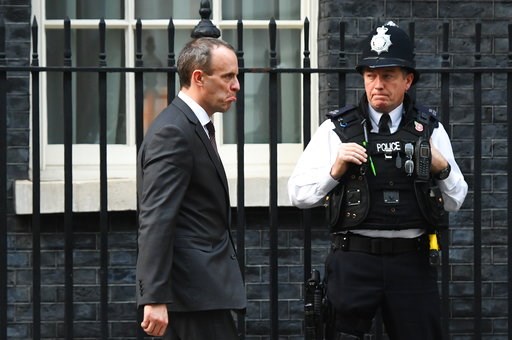 May wins Cabinet backing for Brexit deal but pitfalls remain