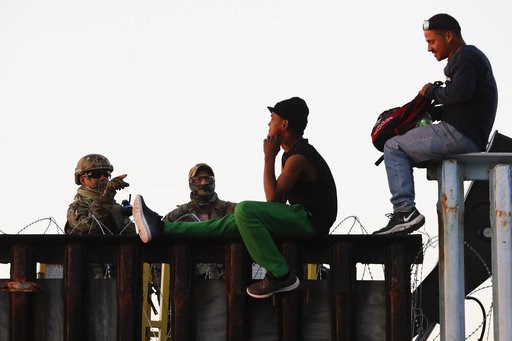 More caravan migrants arrive in Tijuana, brace for long stay