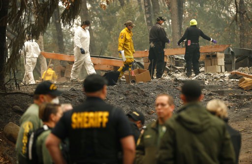 The Latest: Authorities find 8 bodies, deaths rise to 71