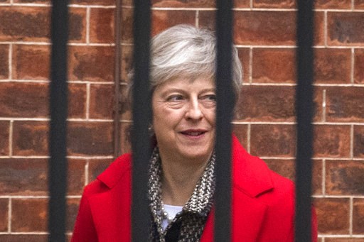 UK leader fights back against critics amid Brexit upheaval