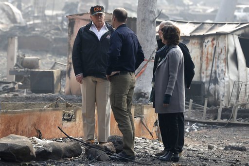 Searchers in California wildfire step up efforts; 77 dead