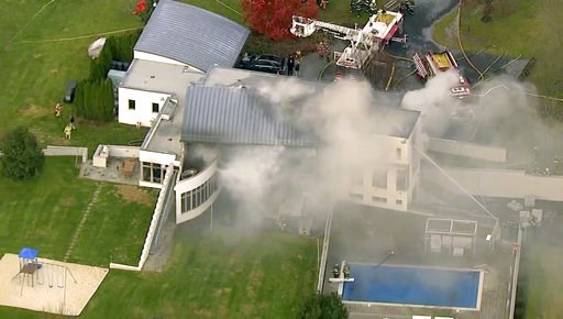 2 kids, 2 adults dead in arson fire at mansion
