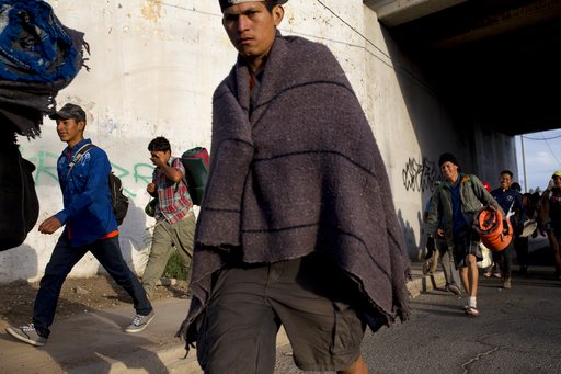 Caravan migrants weigh options after court blocks Trump ban