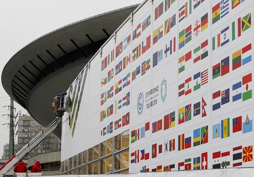 (AP Photo/Czarek Sokolowski). In this Nov. 20, 2018 photo workers decorate the venue of the global climate summit that will be held at the site of the closed 'Katowice' coal mine in the city of Katowice, southern Poland, where - three years after seali... (AP Photo/Czarek Sokolowski). In this Nov. 20, 2018 photo workers decorate the venue of the global climate summit that will be held at the site of the closed 'Katowice' coal mine in the city of Katowice, southern Poland, where - three years after seali...