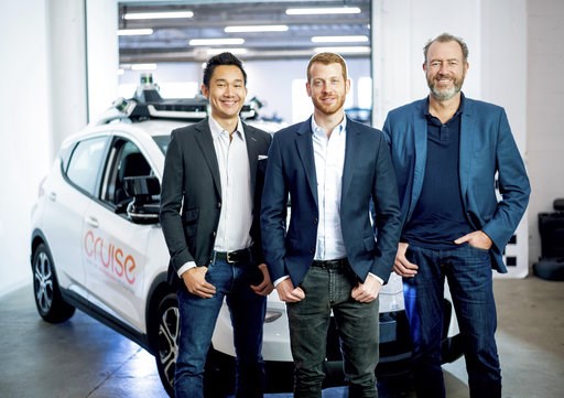 (Noah Berger/General Motors, Cruise via AP). In this Nov. 20, 2018, photo provided by General Motors/Cruise, from left, Cruise Automation's Dan Kan and Kyle Vogt pose for a photo with General Motors' Dan Ammann at Cruise Automation offices in San Franc... (Noah Berger/General Motors, Cruise via AP). In this Nov. 20, 2018, photo provided by General Motors/Cruise, from left, Cruise Automation's Dan Kan and Kyle Vogt pose for a photo with General Motors' Dan Ammann at Cruise Automation offices in San Franc...