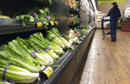 (AP Photo/Mark J. Terrill, File). FILE - In this Nov. 20, 2018 file photo, romaine lettuce sits on the shelves as a shopper walks through the produce area of an Albertsons market in Simi Valley, Calif. After repeated food poisoning outbreaks linked to... (AP Photo/Mark J. Terrill, File). FILE - In this Nov. 20, 2018 file photo, romaine lettuce sits on the shelves as a shopper walks through the produce area of an Albertsons market in Simi Valley, Calif. After repeated food poisoning outbreaks linked to...