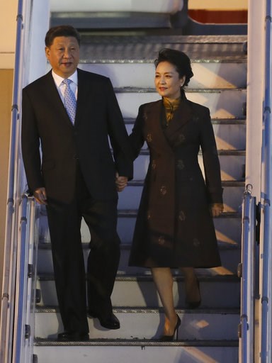 (AP Photo/Martin Mejia). China's President Xi Jinping and first lady Peng Liyuan arrive at the Ministro Pistarini international airport in Buenos Aires, Argentina, Thursday, Nov. 29, 2018. Xi Jinping and other leaders from the Group of 20 industrialize... (AP Photo/Martin Mejia). China's President Xi Jinping and first lady Peng Liyuan arrive at the Ministro Pistarini international airport in Buenos Aires, Argentina, Thursday, Nov. 29, 2018. Xi Jinping and other leaders from the Group of 20 industrialize...