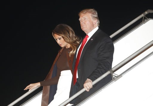 (AP Photo/Pablo Martinez Monsivais). President Donald Trump and first lady Melania Trump walk from Air Force One, Thursday, Nov. 29, 2018, as they arrive at the Ministro Pistarini international airport in Buenos Aires, Argentina. Trump traveled to Arge... (AP Photo/Pablo Martinez Monsivais). President Donald Trump and first lady Melania Trump walk from Air Force One, Thursday, Nov. 29, 2018, as they arrive at the Ministro Pistarini international airport in Buenos Aires, Argentina. Trump traveled to Arge...