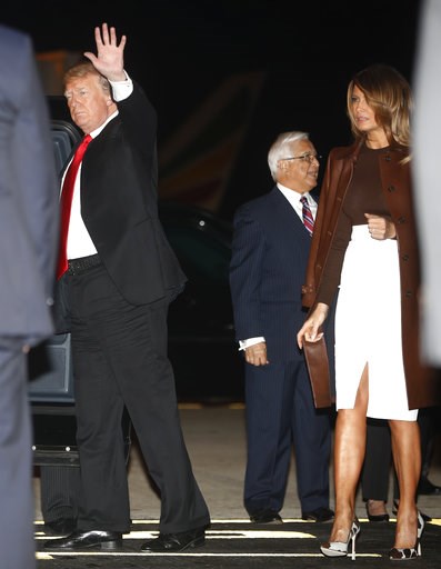 (AP Photo/Pablo Martinez Monsivais). President Donald Trump and first lady Melania Trump walk from Air Force One, Thursday, Nov. 29, 2018, as they arrive in Buenos Aires, Argentina. Trump traveled to Argentina to attend the G20 summit. (AP Photo/Pablo Martinez Monsivais). President Donald Trump and first lady Melania Trump walk from Air Force One, Thursday, Nov. 29, 2018, as they arrive in Buenos Aires, Argentina. Trump traveled to Argentina to attend the G20 summit.