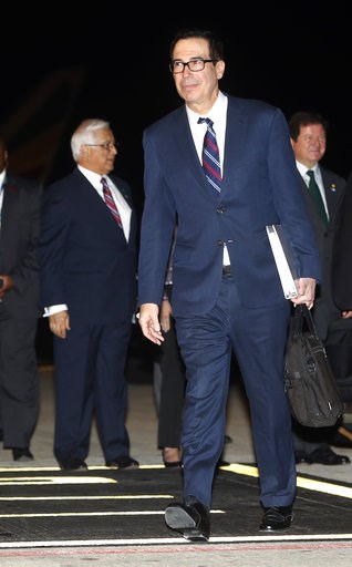 (AP Photo/Pablo Martinez Monsivais). U.S. Treasury Secretary Steven Mnuchin walks after arriving with President Donald Trump and first lady Melania Trump on Air Force One, Thursday, Nov. 29, 2018, as they arrive in Buenos Aires, Argentina. Trump travel... (AP Photo/Pablo Martinez Monsivais). U.S. Treasury Secretary Steven Mnuchin walks after arriving with President Donald Trump and first lady Melania Trump on Air Force One, Thursday, Nov. 29, 2018, as they arrive in Buenos Aires, Argentina. Trump travel...