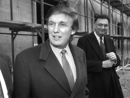 (AP Photo/Igor Tabakov, File). FILE - In this Nov. 5, 1996 file photo, American real estate mogul Donald Trump, left, checks out sites in Moscow, Russia, for luxury residential towers. Trump's decades-long dream of building a luxury tower in the heart ... (AP Photo/Igor Tabakov, File). FILE - In this Nov. 5, 1996 file photo, American real estate mogul Donald Trump, left, checks out sites in Moscow, Russia, for luxury residential towers. Trump's decades-long dream of building a luxury tower in the heart ...
