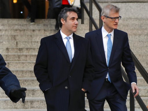 (AP Photo/Julie Jacobson). Michael Cohen, left, walks out of federal court with his attorney Guy Petrillo, Thursday, Nov. 29, 2018, in New York, after pleading guilty to lying to Congress about work he did on an aborted project to build a Trump Tower i... (AP Photo/Julie Jacobson). Michael Cohen, left, walks out of federal court with his attorney Guy Petrillo, Thursday, Nov. 29, 2018, in New York, after pleading guilty to lying to Congress about work he did on an aborted project to build a Trump Tower i...