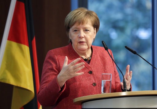 (AP Photo/Michael Sohn). German Chancellor Angela Merkel delivers a speech during the German Ukrainian Economy Forum in Berlin, Germany, Thursday, Nov. 29, 2018. (AP Photo/Michael Sohn). German Chancellor Angela Merkel delivers a speech during the German Ukrainian Economy Forum in Berlin, Germany, Thursday, Nov. 29, 2018.