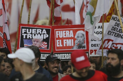 (AP Photo/Natacha Pisarenko). Riot police block an avenue as protesters march against the G20 summit being held in Buenos Aires, Argentina, Friday, Nov. 30, 2018. Leaders from the Group of 20 industrialized nations are meeting in Buenos Aires for two d... (AP Photo/Natacha Pisarenko). Riot police block an avenue as protesters march against the G20 summit being held in Buenos Aires, Argentina, Friday, Nov. 30, 2018. Leaders from the Group of 20 industrialized nations are meeting in Buenos Aires for two d...