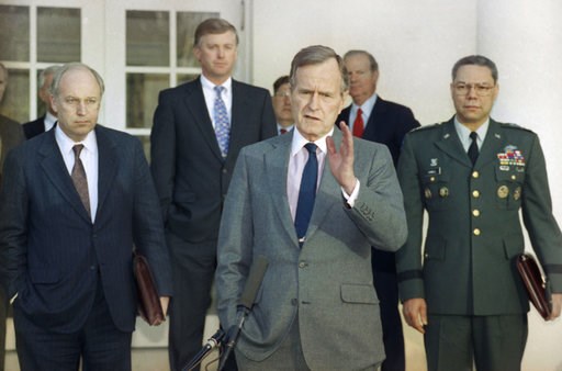 (AP Photo/Ron Edmonds, File). FILE - In this Feb. 11, 1991, file photo, President George H.W. Bush talks to reporters in the Rose Garden of the White House after meeting with top military advisors to discuss the Persian Gulf War. From left are, Defense... (AP Photo/Ron Edmonds, File). FILE - In this Feb. 11, 1991, file photo, President George H.W. Bush talks to reporters in the Rose Garden of the White House after meeting with top military advisors to discuss the Persian Gulf War. From left are, Defense...