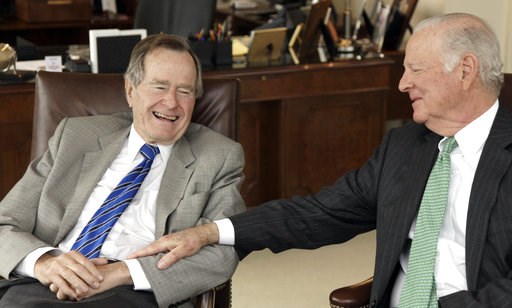 (AP Photo/David J. Phillip). FILE - In this Jan. 18, 2011 file photo, former President George H.W. Bush, left, and former Secretary of State James A. Baker III share a moment as they talk about the Gulf War and liberation of Kuwait, during an interview... (AP Photo/David J. Phillip). FILE - In this Jan. 18, 2011 file photo, former President George H.W. Bush, left, and former Secretary of State James A. Baker III share a moment as they talk about the Gulf War and liberation of Kuwait, during an interview...