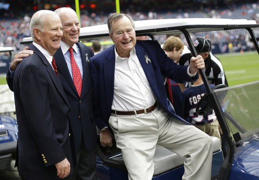 (AP Photo/Eric Gay). FILE - In this Nov. 4, 2012 file photo, former President George H. W. Bush, right, former Secretary of State James Baker, left, and Houston Texans owner Bob McNair pose together before an NFL football game against the Buffalo Bills... (AP Photo/Eric Gay). FILE - In this Nov. 4, 2012 file photo, former President George H. W. Bush, right, former Secretary of State James Baker, left, and Houston Texans owner Bob McNair pose together before an NFL football game against the Buffalo Bills...