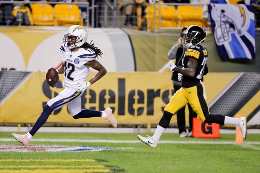 (AP Photo/Gene J. Puskar). Los Angeles Chargers wide receiver Travis Benjamin (12) dashes past Pittsburgh Steelers cornerback Mike Hilton (28) on his way to a touchdown after making a catch in the first half of an NFL football game, Sunday, Dec. 2, 201... (AP Photo/Gene J. Puskar). Los Angeles Chargers wide receiver Travis Benjamin (12) dashes past Pittsburgh Steelers cornerback Mike Hilton (28) on his way to a touchdown after making a catch in the first half of an NFL football game, Sunday, Dec. 2, 201...