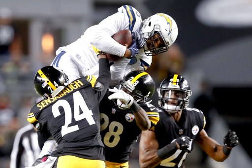 (AP Photo/Don Wright). Los Angeles Chargers wide receiver Tyrell Williams (16) makes a catch over Pittsburgh Steelers cornerback Coty Sensabaugh (24) in the first half of an NFL football game, Sunday, Dec. 2, 2018, in Pittsburgh. (AP Photo/Don Wright). Los Angeles Chargers wide receiver Tyrell Williams (16) makes a catch over Pittsburgh Steelers cornerback Coty Sensabaugh (24) in the first half of an NFL football game, Sunday, Dec. 2, 2018, in Pittsburgh.