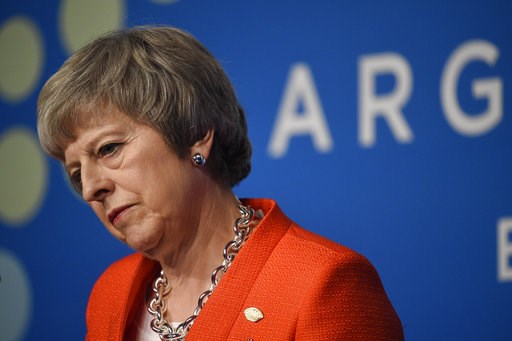 (AP Photo/Gustavo Garello). Britain's Prime Minister Theresa May listens to a question during a press conference after the G20 Leader's Summit in Buenos Aires, Argentina, Saturday, Dec. 1, 2018. Leaders from the Group of 20 industrialized nations met f... (AP Photo/Gustavo Garello). Britain's Prime Minister Theresa May listens to a question during a press conference after the G20 Leader's Summit in Buenos Aires, Argentina, Saturday, Dec. 1, 2018. Leaders from the Group of 20 industrialized nations met f...