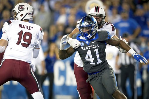 (AP Photo/Bryan Woolston, File). FILE - In this Sept. 29, 2018, file photo, Kentucky linebacker Josh Allen (41) rushes South Carolina quarterback Jake Bentley (19) during the second half of an NCAA college football game in Lexington, Ky. Allen is the d... (AP Photo/Bryan Woolston, File). FILE - In this Sept. 29, 2018, file photo, Kentucky linebacker Josh Allen (41) rushes South Carolina quarterback Jake Bentley (19) during the second half of an NCAA college football game in Lexington, Ky. Allen is the d...