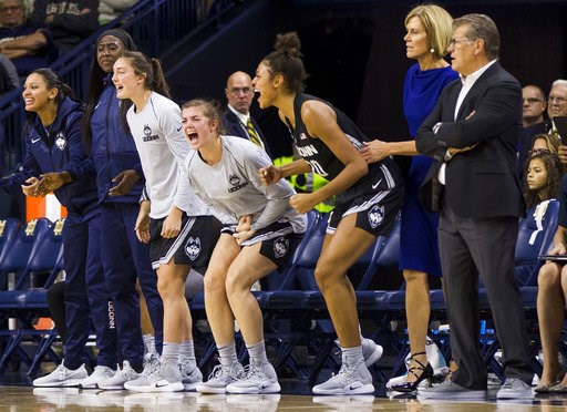 (AP Photo/Robert Franklin). Connecticut players celebrate on the bench during the second half of an NCAA college basketball game against Notre Dame, Sunday, Dec. 2, 2018, in South Bend, Ind. (AP Photo/Robert Franklin). Connecticut players celebrate on the bench during the second half of an NCAA college basketball game against Notre Dame, Sunday, Dec. 2, 2018, in South Bend, Ind.