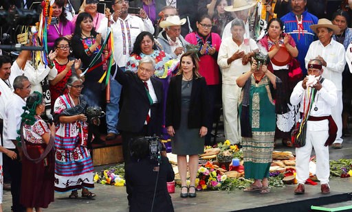 (AP Photo/Marco Ugarte). Mexico's new President Andres Manuel Lopez Obrador, center, participates in a traditional indigenous ceremony at the Zocalo, in Mexico City, Saturday, Dec. 1, 2018. Mexicans are getting more than just a new president Saturday. ... (AP Photo/Marco Ugarte). Mexico's new President Andres Manuel Lopez Obrador, center, participates in a traditional indigenous ceremony at the Zocalo, in Mexico City, Saturday, Dec. 1, 2018. Mexicans are getting more than just a new president Saturday. ...